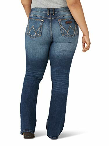 Back view of woman wearing bootcut jeans.